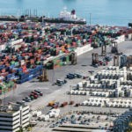 Aerial view of Containers with cargo ship in Port De Barcelona (Catalonia), Spain